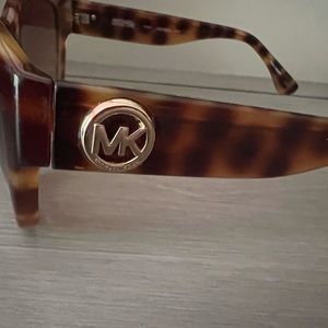 Michael Kors sunglasses, used, some scratches.